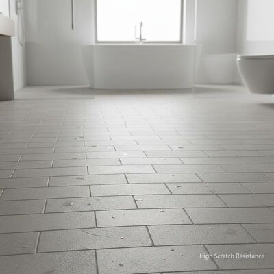 Carrelage de salle de bain en porcelaine à haute résistance aux rayures, surface légèrement texturée offrant une résistance au glissement et un revêtement de sol élégant pour les salles de bain